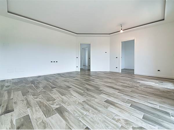 CARONNO SUPER RECENTE - TRILOCALE CON TERRAZZO, BOX AUTO E CANTINA