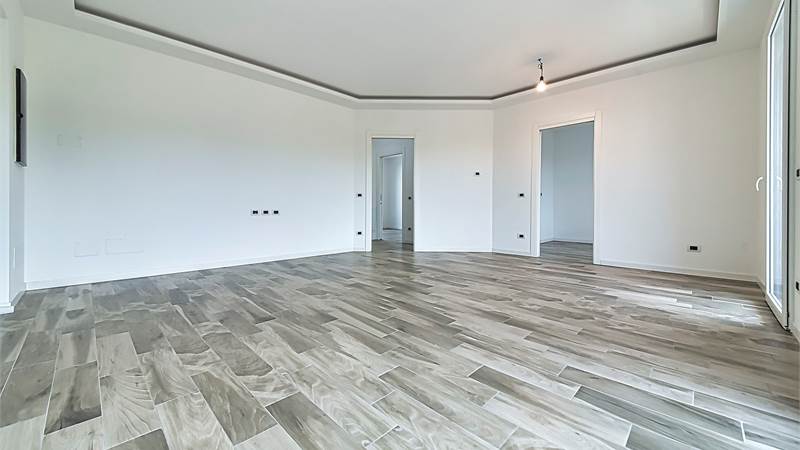 CARONNO SUPER RECENTE - TRILOCALE CON TERRAZZO, BOX AUTO E CANTINA